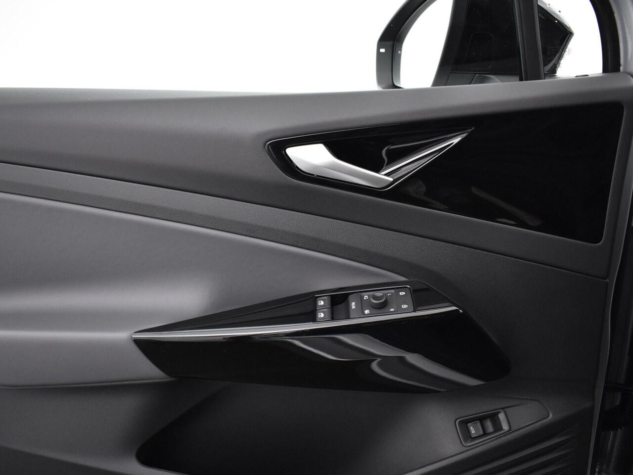 Volkswagen ID.4 Pro Limited Edition 77 kWh accu. 286 pk · Achteruitcamera · Draadloze telefoonlader · Sfeerverlichting ·