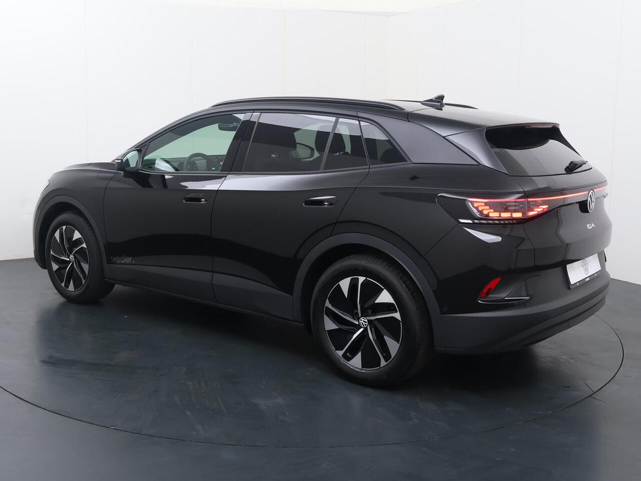 Volkswagen ID.4 Pro Business 77 kWh 286pk | 17% bijtelling | LED Matrix | Elektrisch bedienbare achterklep | Navigatie | Achteruitrijcamera | Adaptive cruise control |