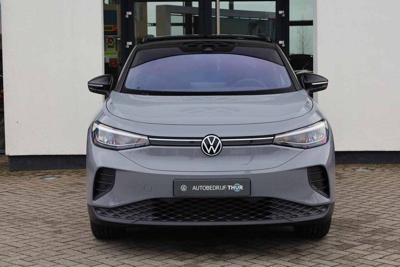 Volkswagen ID.4 Pro Limited Edition 77 kWh 286PK / 210kW, Elektrisch uitklapbare trekhaak, verwarmbare voorstoelen, verwarmbaar multifunctioneel lederen stuurwiel, draadloos telefoon laden, keyless start & entry, achteruitrijcamera (rear view), parkeersensoren voor en ac