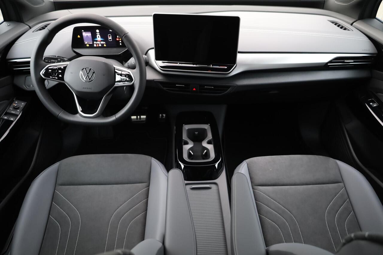 Volkswagen ID.4 Pro Limited Edition 77 kWh 286PK / 210kW, Elektrisch uitklapbare trekhaak, verwarmbare voorstoelen, verwarmbaar multifunctioneel lederen stuurwiel, draadloos telefoon laden, keyless start & entry, achteruitrijcamera (rear view), parkeersensoren voor en ac