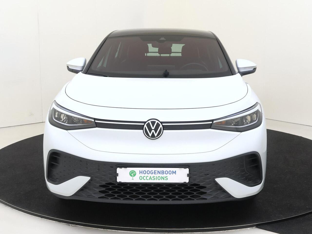 Volkswagen ID.5 Pro Advantage 77 kWh | Achteruitrijcamera | Adaptieve cruise control | Parkeerassistent | 3-zone airco | Keyless | CarPlay | Navigatie | Stoel- en stuurwielverwarming |