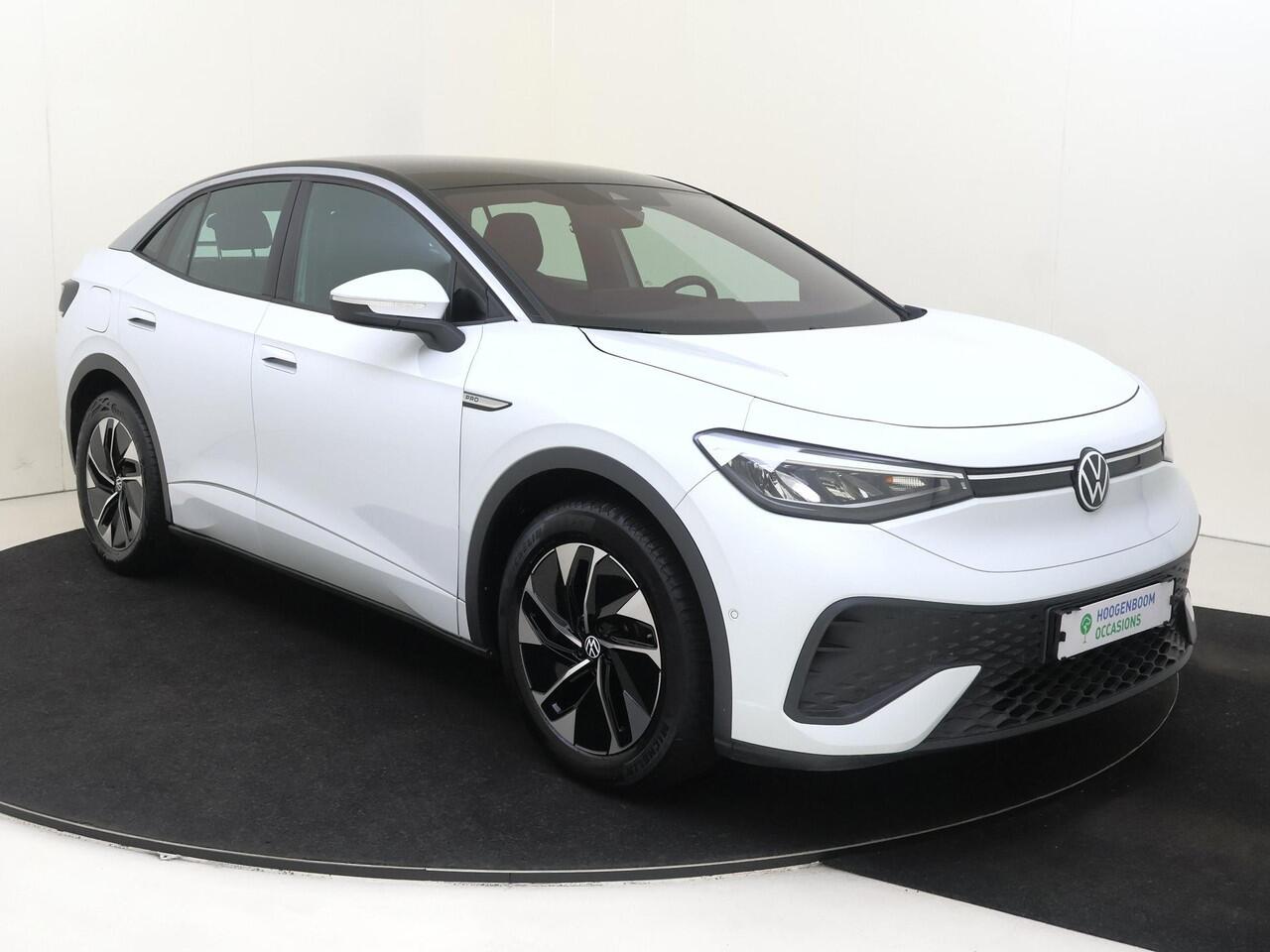 Volkswagen ID.5 Pro Advantage 77 kWh | Achteruitrijcamera | Adaptieve cruise control | Parkeerassistent | 3-zone airco | Keyless | CarPlay | Navigatie | Stoel- en stuurwielverwarming |