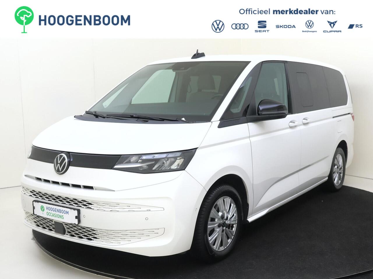 Volkswagen MULTIVAN 1.4 eHybrid L2 Style 6 versnellingen DSG | SoH 94% | 7p | Parkeerassistent | Stoelverwarming | Achteruitrijcamera | Navigatie | 3-zone airco | CarPlay |
