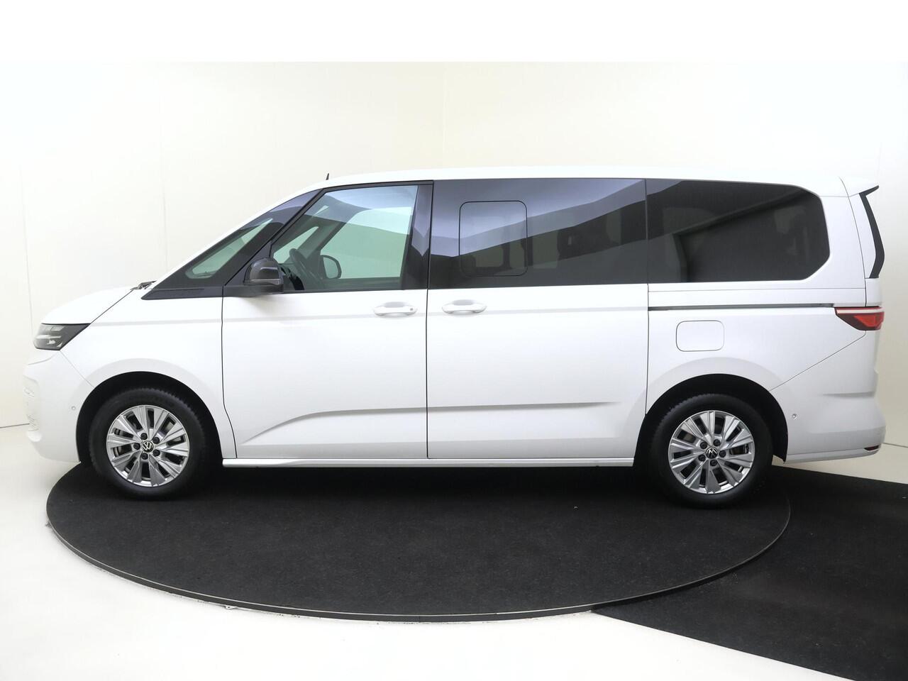 Volkswagen MULTIVAN 1.4 eHybrid L2 Style 6 versnellingen DSG | SoH 94% | 7p | Parkeerassistent | Stoelverwarming | Achteruitrijcamera | Navigatie | 3-zone airco | CarPlay |