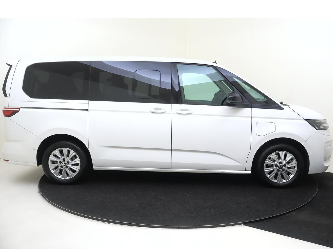 Volkswagen MULTIVAN 1.4 eHybrid L2 Style 6 versnellingen DSG | SoH 94% | 7p | Parkeerassistent | Stoelverwarming | Achteruitrijcamera | Navigatie | 3-zone airco | CarPlay |