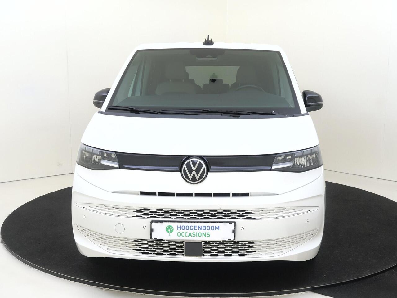 Volkswagen MULTIVAN 1.4 eHybrid L2 Style 6 versnellingen DSG | SoH 94% | 7p | Parkeerassistent | Stoelverwarming | Achteruitrijcamera | Navigatie | 3-zone airco | CarPlay |