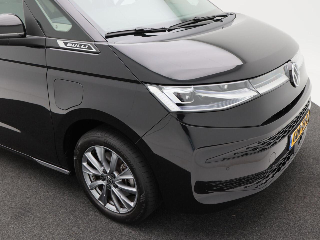 Volkswagen MULTIVAN 1.4 eHybrid L2 Bulli Edition | 7-Persoons | Panoramadak | Trekhaak | Adaptive Cruise | Carplay | Camera | Navigatie | Stoelverwarming | 18 inch | 35.946 Km!!