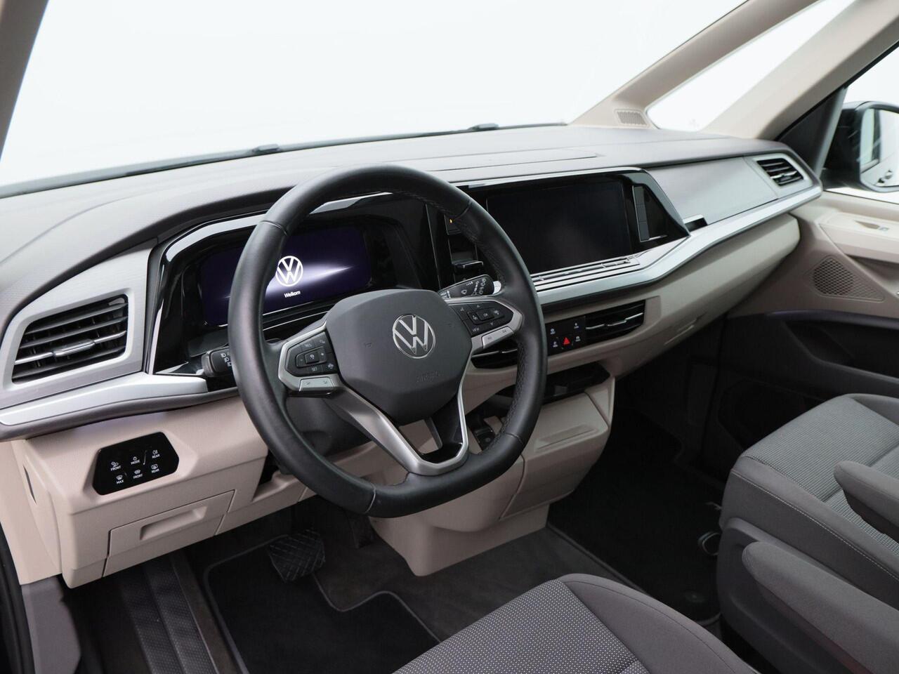 Volkswagen MULTIVAN 1.4 eHybrid L2 Bulli Edition | 7-Persoons | Panoramadak | Trekhaak | Adaptive Cruise | Carplay | Camera | Navigatie | Stoelverwarming | 18 inch | 35.946 Km!!