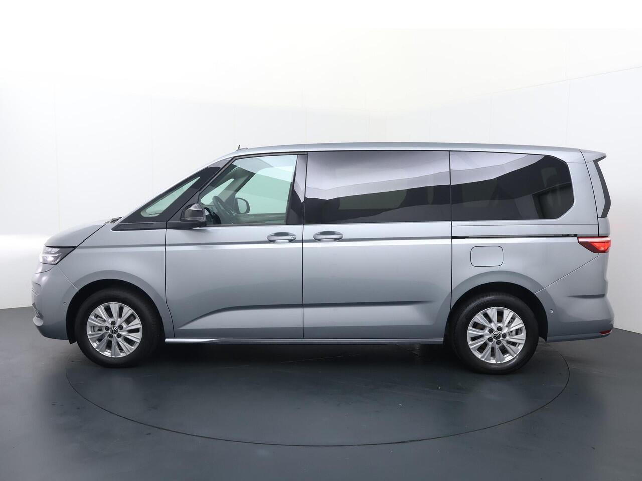Volkswagen MULTIVAN Bedrijfswagens Economy Business L2 1.5 eHybrid EU6 180 kW (245pk) | Bestelwagen toegestaan voor ALLE ZERO Emissie Milieu-zones M1-Kenteken | Schot laadruimte achter voorstoelen | Houten Laadvloer | Prijs excl. BTW