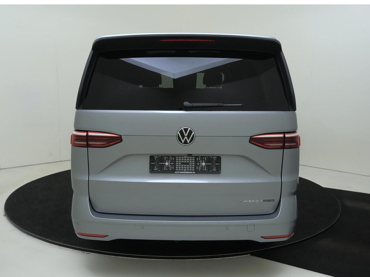 Volkswagen MULTIVAN Bulli L2 1.5 Ehybrid 180kW 245 pk DSG 4 motion | Easy Open Paket Basis | Multifunctionele verschuifbare tafel in passagiersruimte | Navigatiesysteem '' Discover Pro'' | Privacy Plus glas (90%) vanaf B-stijl |