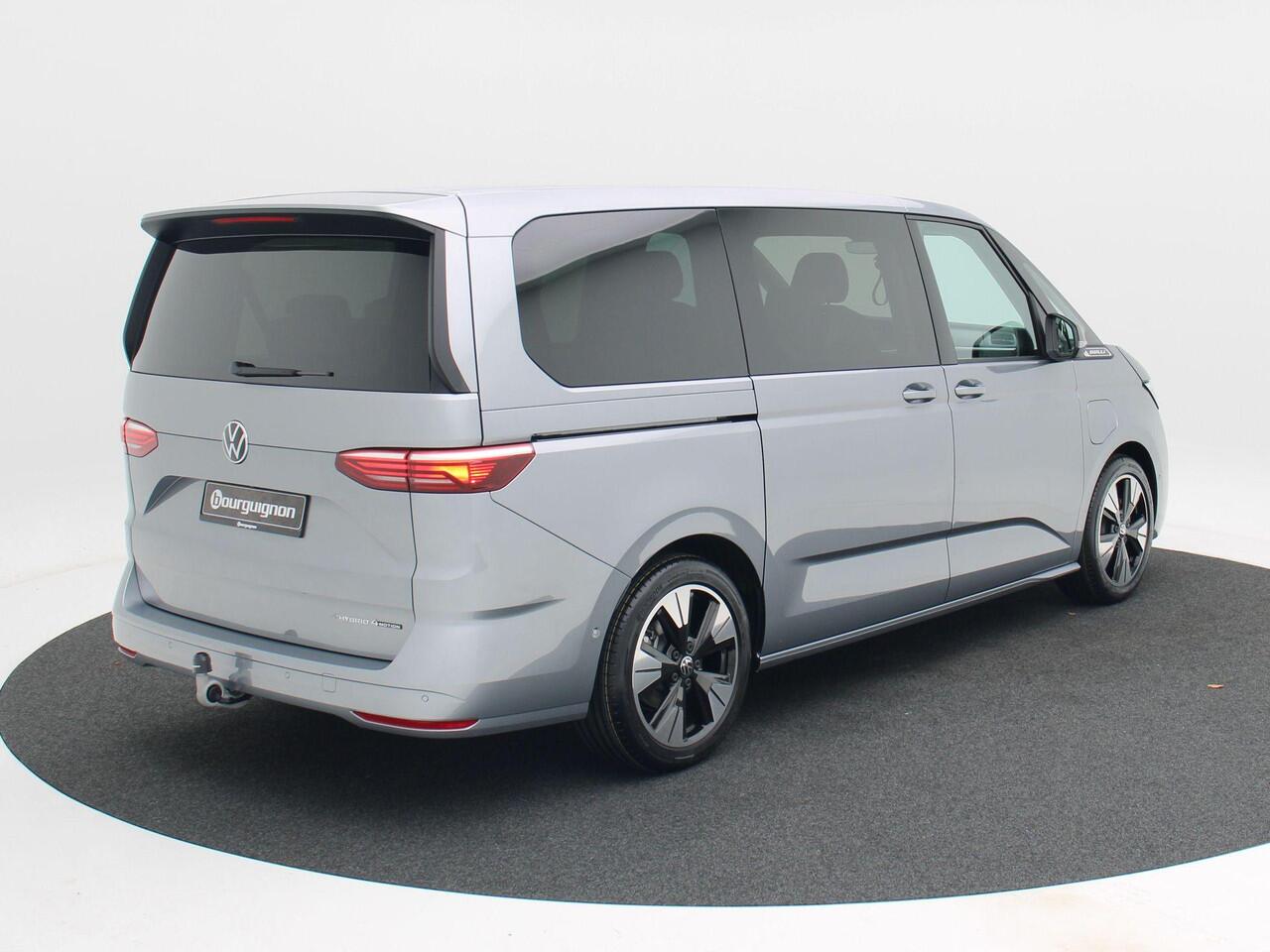 Volkswagen MULTIVAN Bedrijfswagens Bulli L2 1.5 eHybrid EU6 180 kW/245pk DSG 4Motion | Incl BTW/BPM | 7 zitplaatsen vis-a-vis | Trekhaak | Stoelverwarming | Verlaagd onderstel dynamisch | 19" Halmstad lichtmetaal |