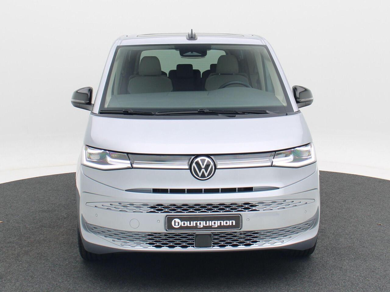 Volkswagen MULTIVAN Bedrijfswagens Bulli L2 1.5 eHybrid EU6 180 kW/245pk DSG 4Motion | Incl BTW/BPM | 7 zitplaatsen vis-a-vis | Trekhaak | Stoelverwarming | Verlaagd onderstel dynamisch | 19" Halmstad lichtmetaal |