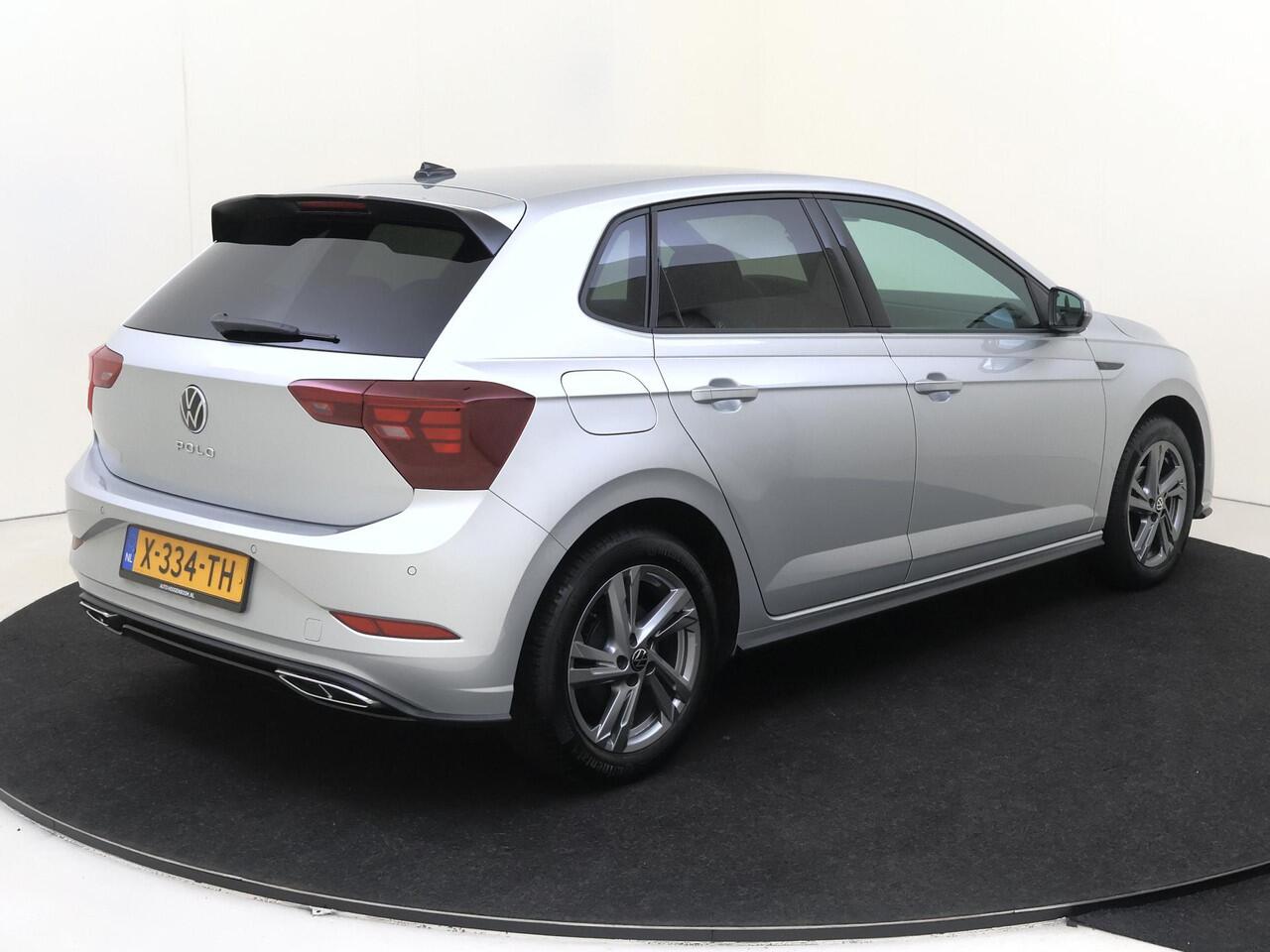 Volkswagen POLO 1.0 TSI R-Line | Digital cockpit Pro | Achteruitrijcamera | Climate control | Adaptieve cruise control | CarPlay | Elektrisch inklapbare buitenspiegels | Getint glas |