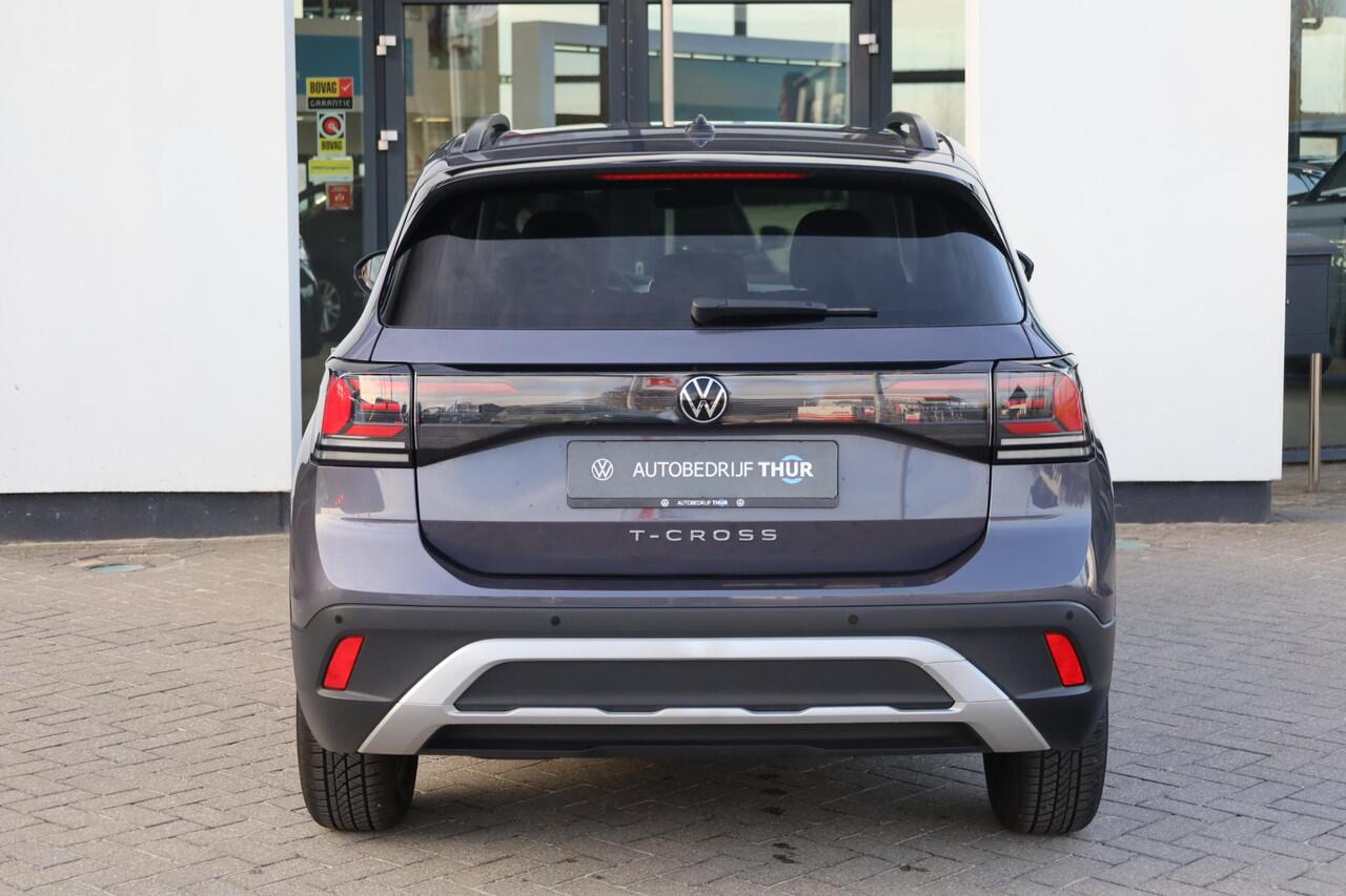 Volkswagen T-Cross 1.0 TSI Life Edition 60mnd 100.000km garantie privacy glas stoelverwarming acc adaptieve cruise control 4 seizoenen banden navigatie draadloos via app connect / carplay light assist climatronic 2 zone ambiente verlichting dimmende binnenspiegel travel ass