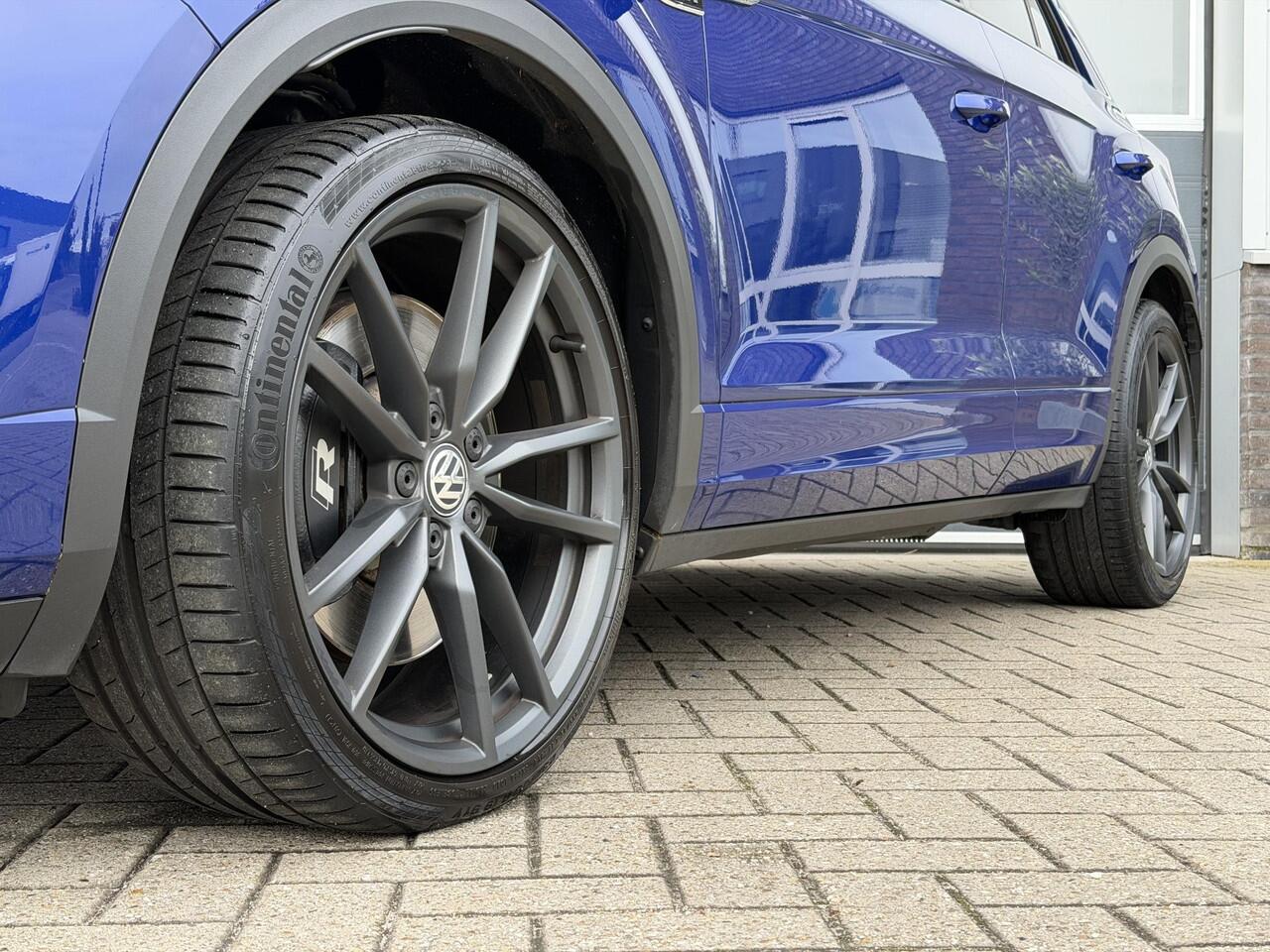 Volkswagen T-Roc 2.0 TSI 4Motion R | AKRA | Schuif-kanteldak | BEATS | Afn. Trekhaak | DCC | VIRTUAL | Camera | LEDER | KEYLESS | Side Assist | CarPlay