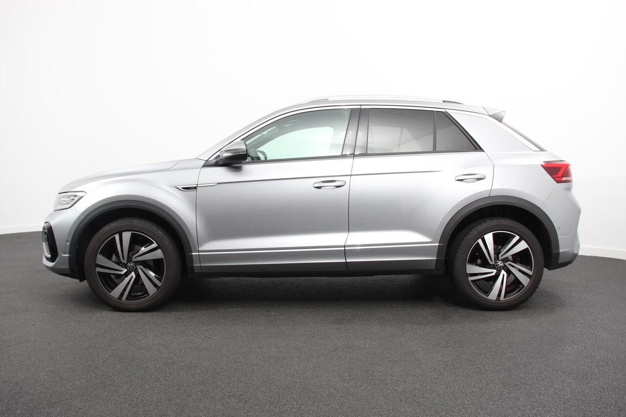 Volkswagen T-Roc 1.5 TSI 150pk DSG R-Line | Navigatie | Apple Carplay/Android Auto | Parkeersensoren | Camera | Blind Spot Assist | Adaptive Cruise Control | Elektrische achterklep | Stoel- en stuurverwarming | Climate Control | Ledverlichting | Virtual Cockpit