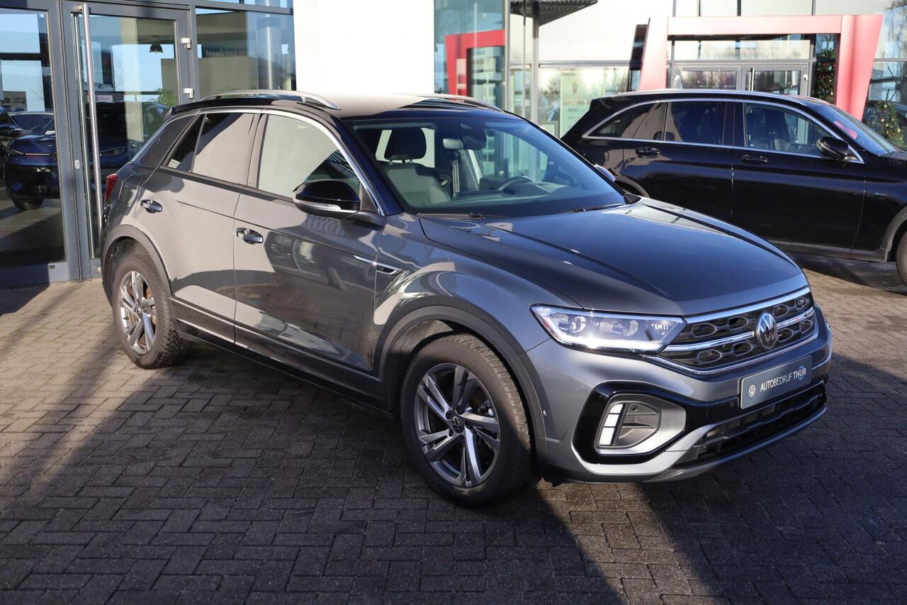 Volkswagen T-Roc 1.5 TSI R-Line ergo stoel achteruitrijcamera privacy glas trekhaak stoelverwarming two tone zwart dak r line in en exterieur navigatie geactiveerd pdc voor en achter led plus draadloos carplay climatronic spraakbediening