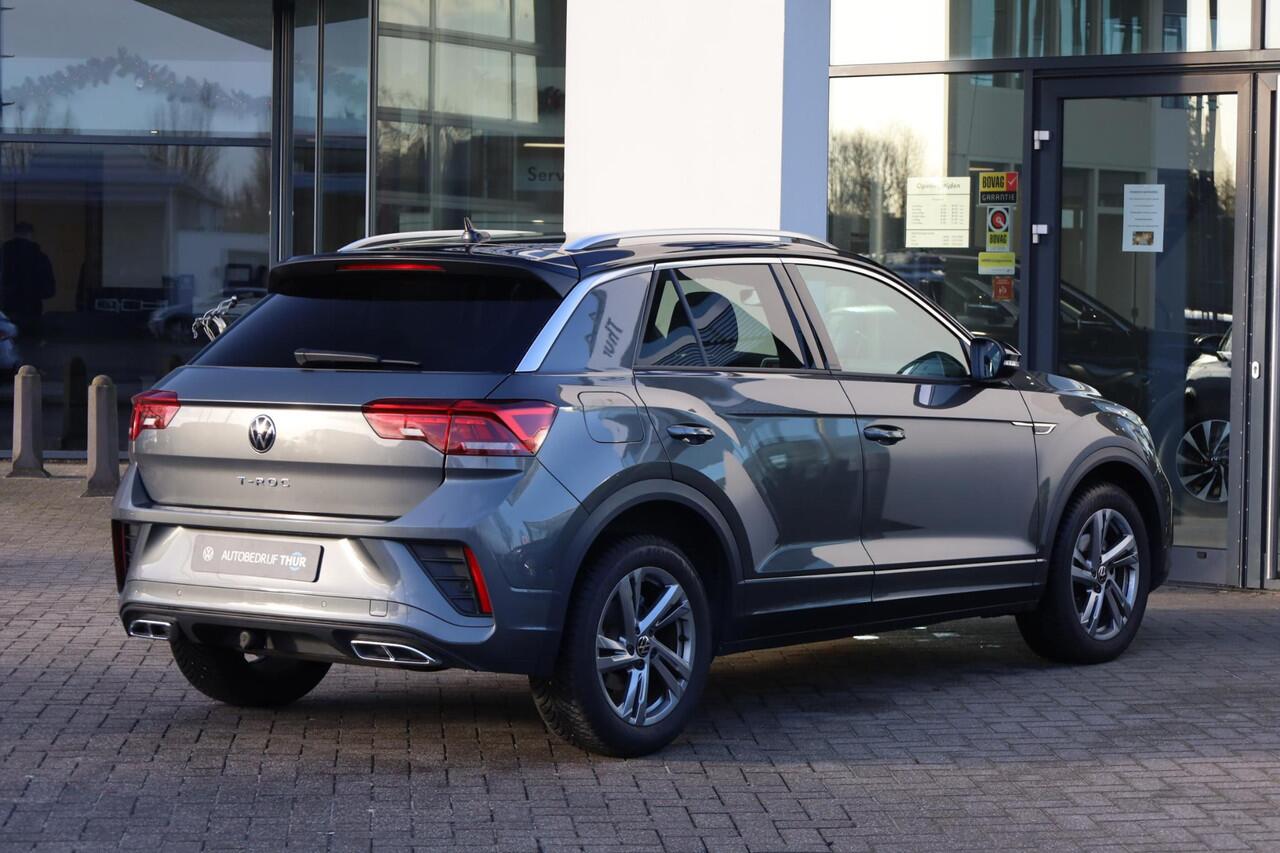 Volkswagen T-Roc 1.5 TSI R-Line ergo stoel achteruitrijcamera privacy glas trekhaak stoelverwarming two tone zwart dak r line in en exterieur navigatie geactiveerd pdc voor en achter led plus draadloos carplay climatronic spraakbediening