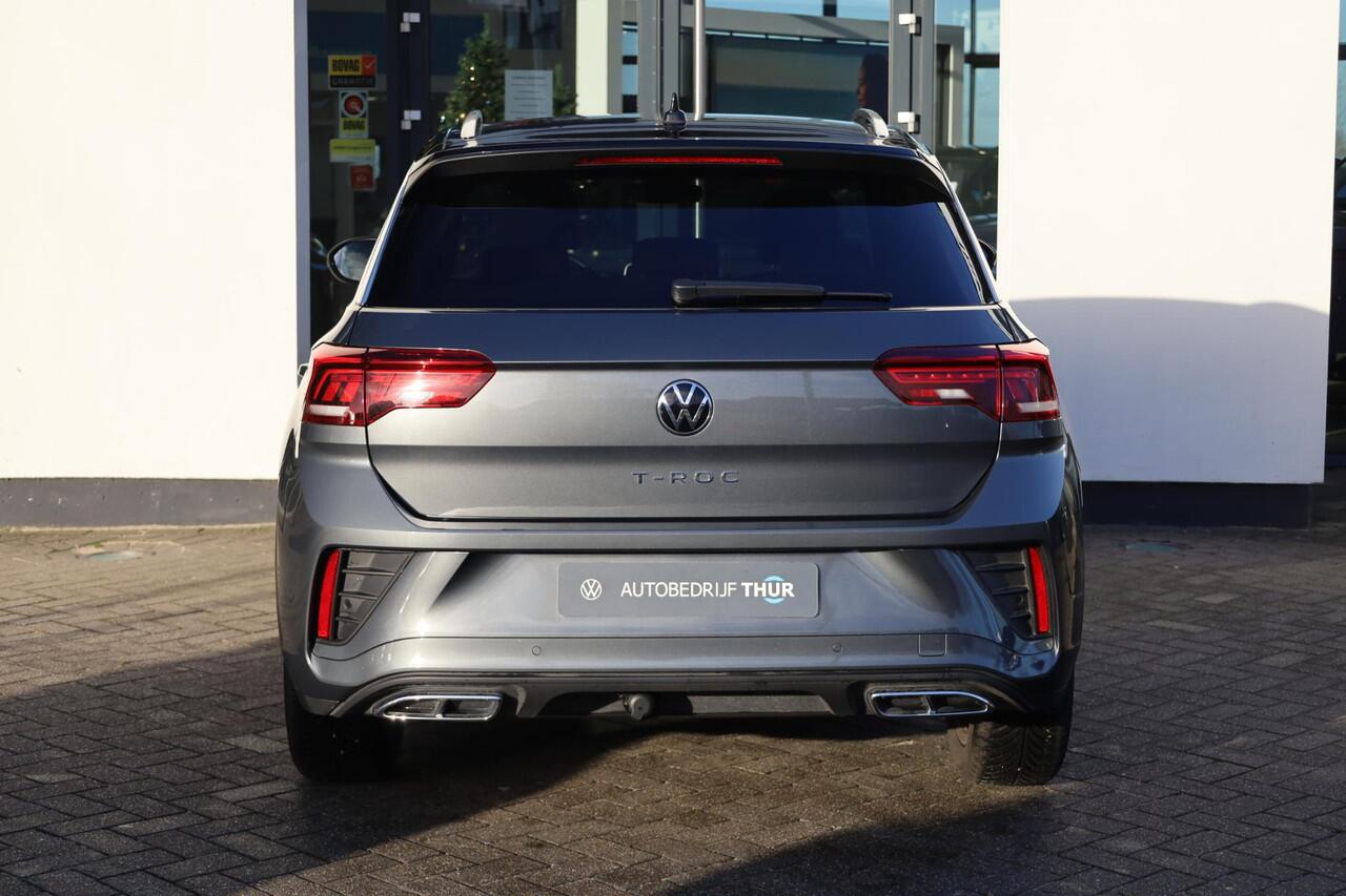 Volkswagen T-Roc 1.5 TSI R-Line ergo stoel achteruitrijcamera privacy glas trekhaak stoelverwarming two tone zwart dak r line in en exterieur navigatie geactiveerd pdc voor en achter led plus draadloos carplay climatronic spraakbediening