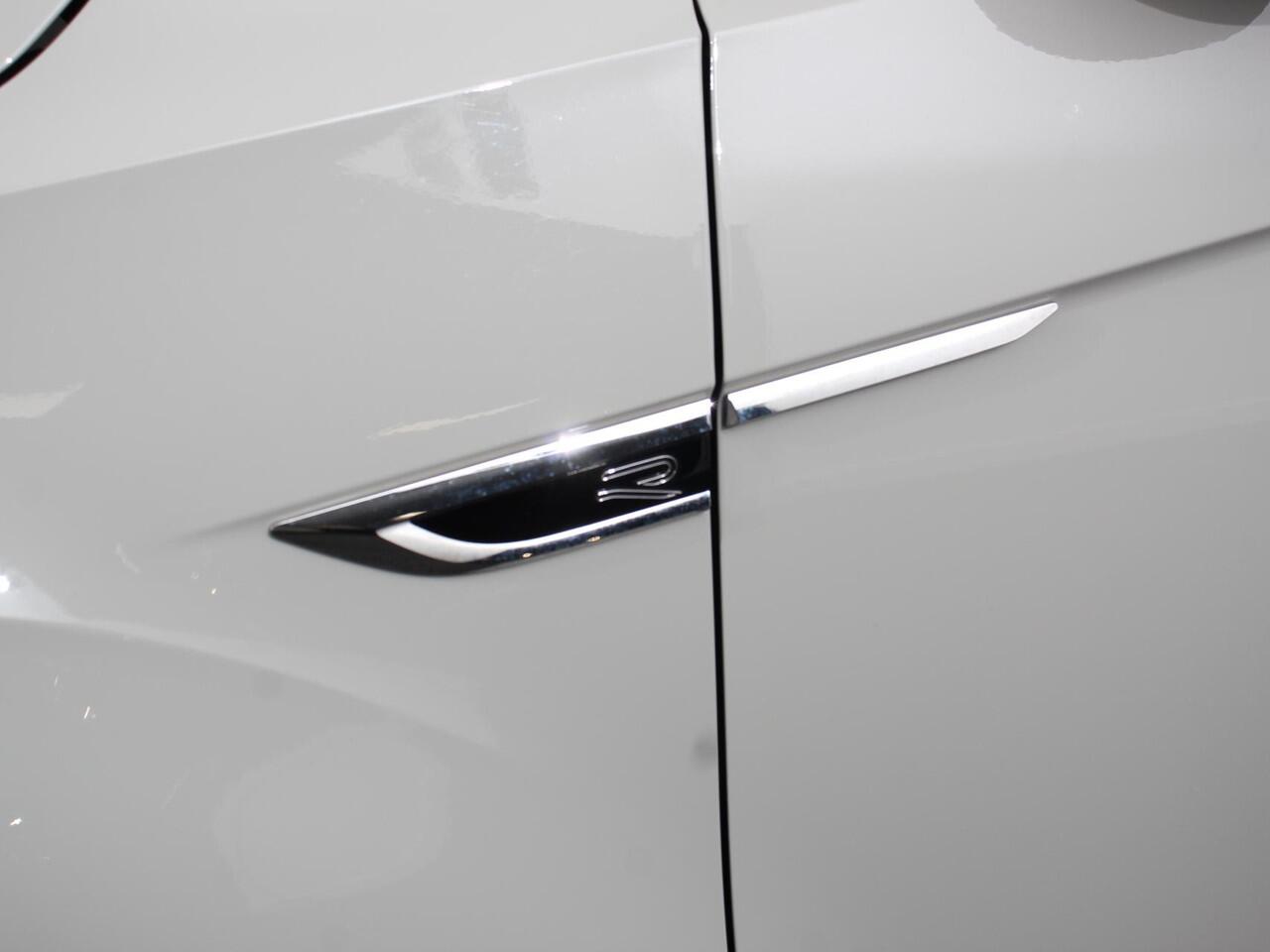 Volkswagen T-Roc 1.5 TSI DSG R-Line+Blackpack | Climate control | Adaptieve cruise control | Panoramadak | LED | Navigatie | Achteruitrijcamera | Parkeersensoren | Apple Carplay/ Android Auto | Radio