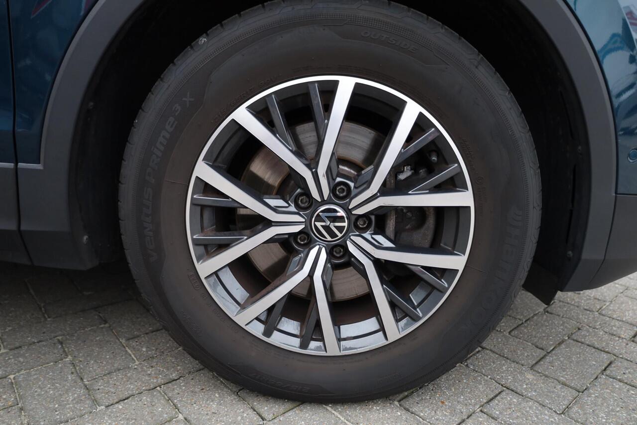 Volkswagen TIGUAN 1.4 TSI eHybrid Life Business panoramadak wegklapbare trekhaak area view camera ergo stoelen stoel en stuurwielverwarming elektrische achterklep digital cockpit pro draadloos carplay en draadloos laden park assist lendesteunen voor massage stand elektrisc