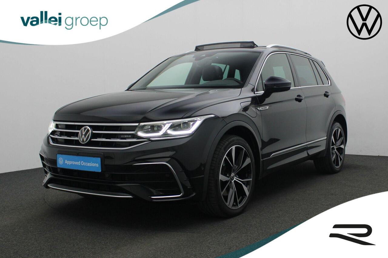 Volkswagen TIGUAN 1.4 TSI 218 pk DSG eHybrid R-Line Business+ | Panoramadak | Trekhaak | Leder | Geheugenstoelen | Navigatie Discover Pro | Adaptief onderstel | Stoel-/achterbankverwarming