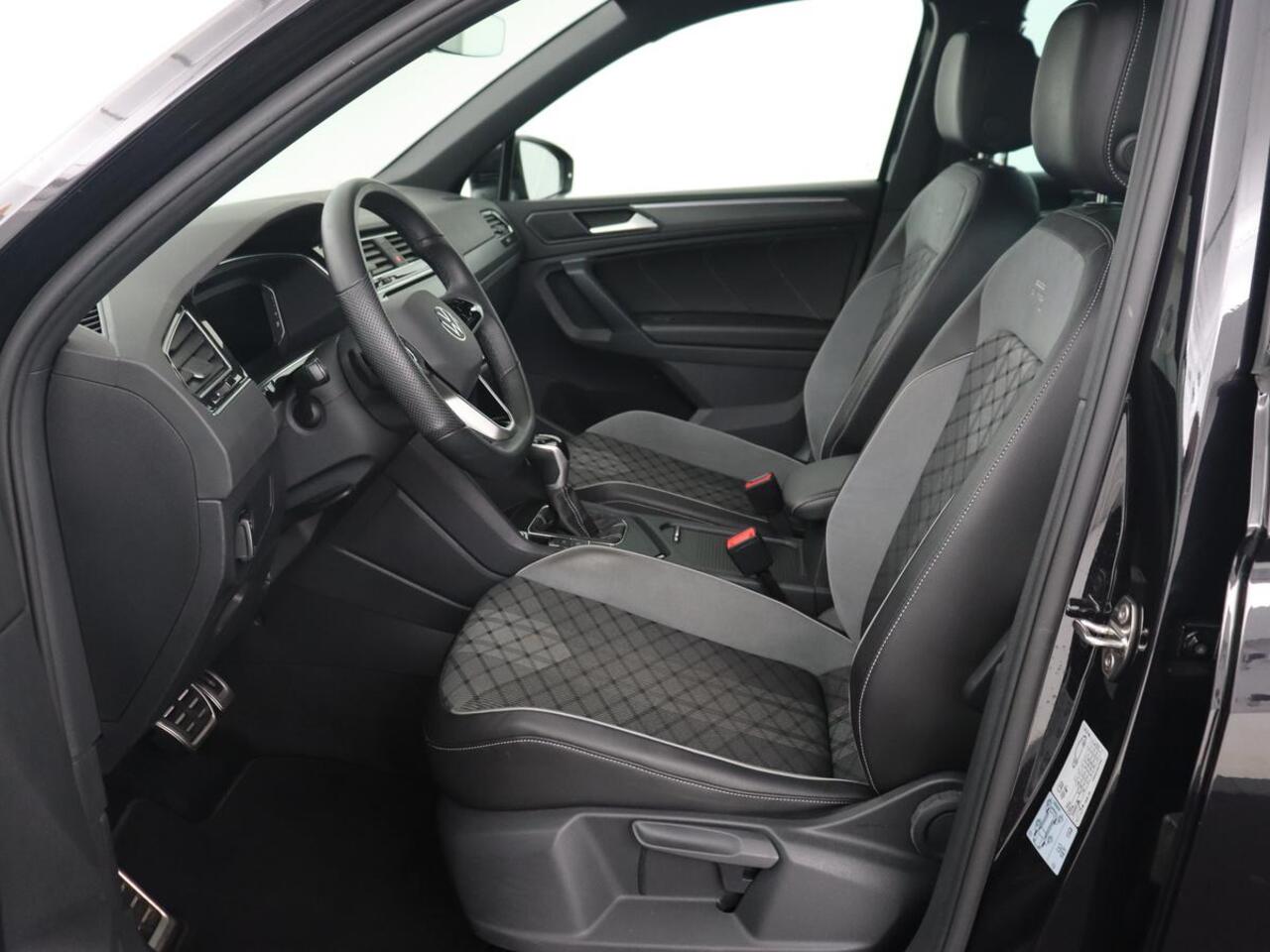 Volkswagen TIGUAN 1.5 TSI R-Line Business+ | Automaat | Trekhaak | Carplay | Stoelverwarming | Stuurverwarming | Adaptive Cruise | LED | Sfeerverlichting | Climate controle | LMV 20 inch