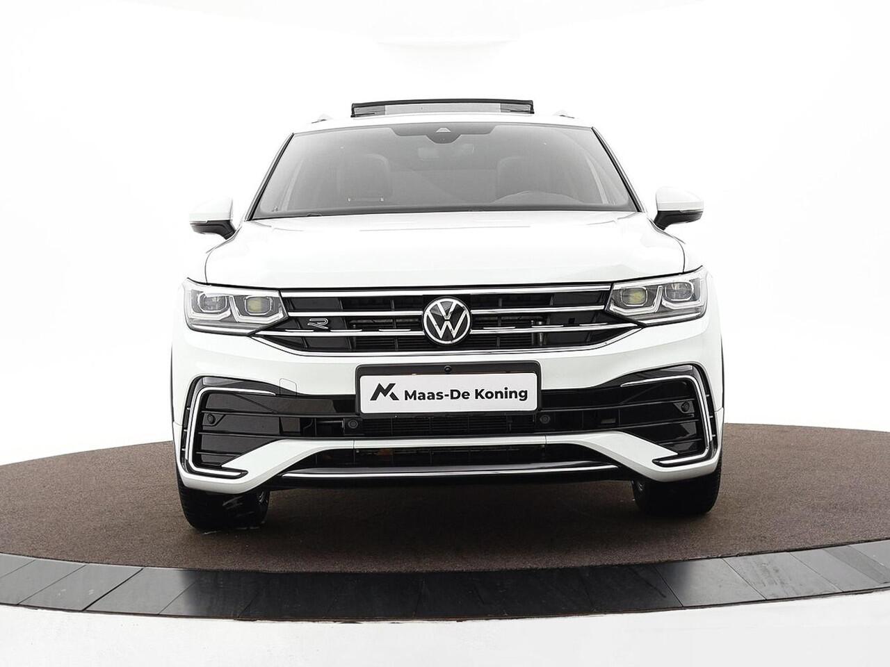 Volkswagen TIGUAN 1.5 TSI 150pk DSG R-Line Business+ · Panoramadak · Leder · Apple/Android Car Play · Dodehoeksensor · Elek. Achterklep · 360 Camera · Keyless · 19'' Inch ·