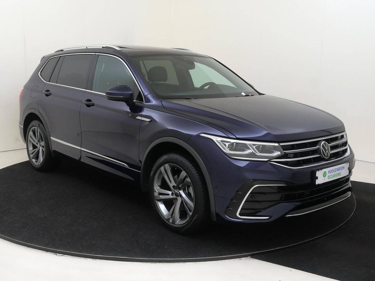 Volkswagen TIGUAN Allspace 1.5 TSI R-Line Business+ | Panoramadak | Trekhaak | LED matrix verlichting | 3-zone airco | Dodehoek detectie | Keyless | Adaptieve cruise control |