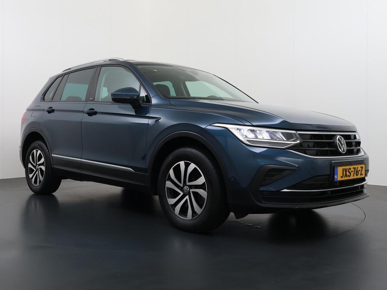 Volkswagen TIGUAN 1.4 TSI eHybrid PHEV VAN ¤32.900,- NU VOOR SLECHTS ¤29.877,- Uw LENTEVOORDEEL ¤3.023,- |ADAPTIVE CRUISE CONTROL| PANO| STOEL + STUURVERWARMING| 360 CAMERA| PARKEER ASSISTENT| RIJKLAARPRIJS INCL. 12 MND BOVAG GARANTIE