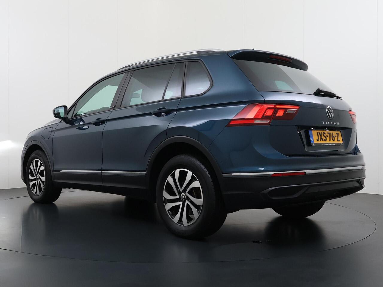 Volkswagen TIGUAN 1.4 TSI eHybrid PHEV VAN ¤32.900,- NU VOOR SLECHTS ¤29.877,- Uw LENTEVOORDEEL ¤3.023,- |ADAPTIVE CRUISE CONTROL| PANO| STOEL + STUURVERWARMING| 360 CAMERA| PARKEER ASSISTENT| RIJKLAARPRIJS INCL. 12 MND BOVAG GARANTIE