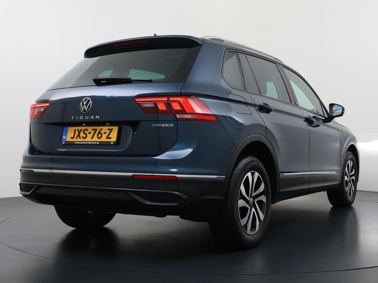 Volkswagen TIGUAN 1.4 TSI eHybrid PHEV VAN ¤32.900,- NU VOOR SLECHTS ¤29.877,- Uw LENTEVOORDEEL ¤3.023,- |ADAPTIVE CRUISE CONTROL| PANO| STOEL + STUURVERWARMING| 360 CAMERA| PARKEER ASSISTENT| RIJKLAARPRIJS INCL. 12 MND BOVAG GARANTIE