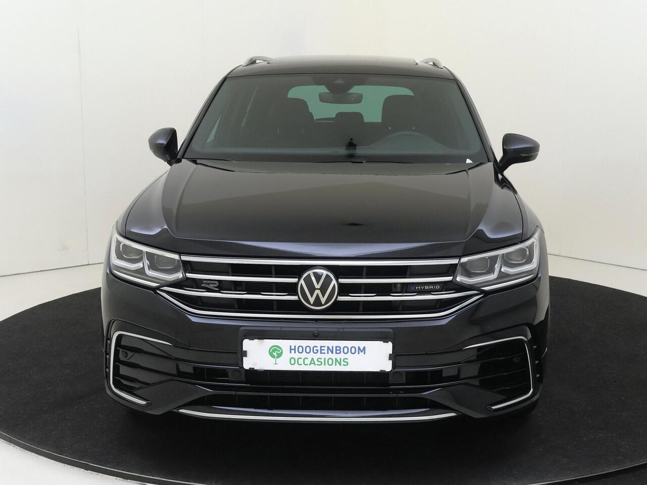 Volkswagen TIGUAN 1.4 TSI eHybrid R-Line Business | SoH 89% | Panoramadak | Trekhaak | Lederen bekleding | 360 camera | Keyless | Parkeerassistent | Stoel- en stuurwielverwarming | Navigatie |