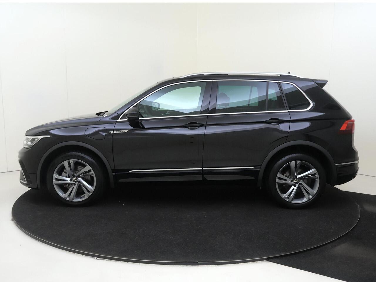 Volkswagen TIGUAN 1.4 TSI eHybrid R-Line Business | SoH 89% | Panoramadak | Trekhaak | Lederen bekleding | 360 camera | Keyless | Parkeerassistent | Stoel- en stuurwielverwarming | Navigatie |
