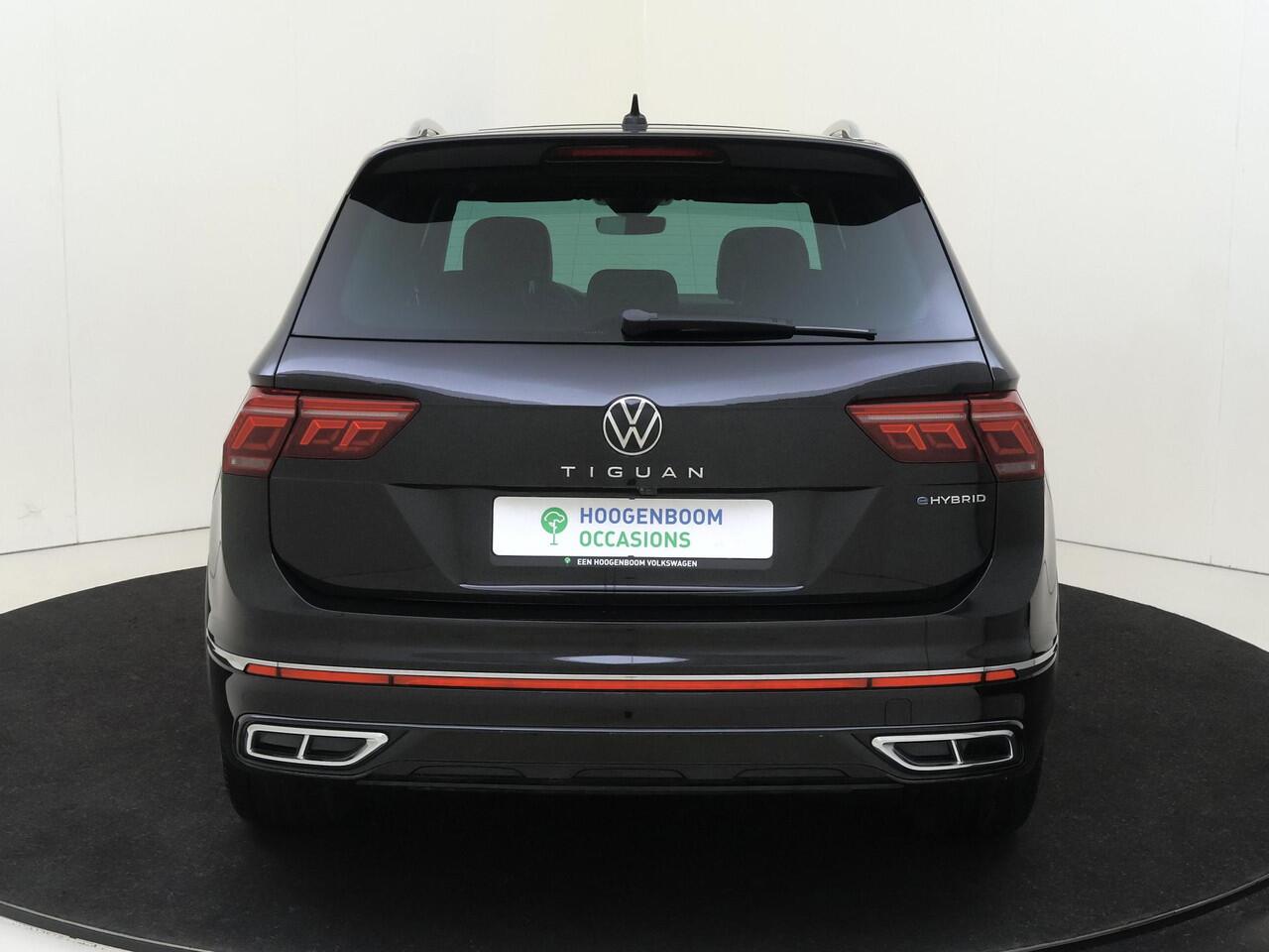 Volkswagen TIGUAN 1.4 TSI eHybrid R-Line Business | SoH 89% | Panoramadak | Trekhaak | Lederen bekleding | 360 camera | Keyless | Parkeerassistent | Stoel- en stuurwielverwarming | Navigatie |