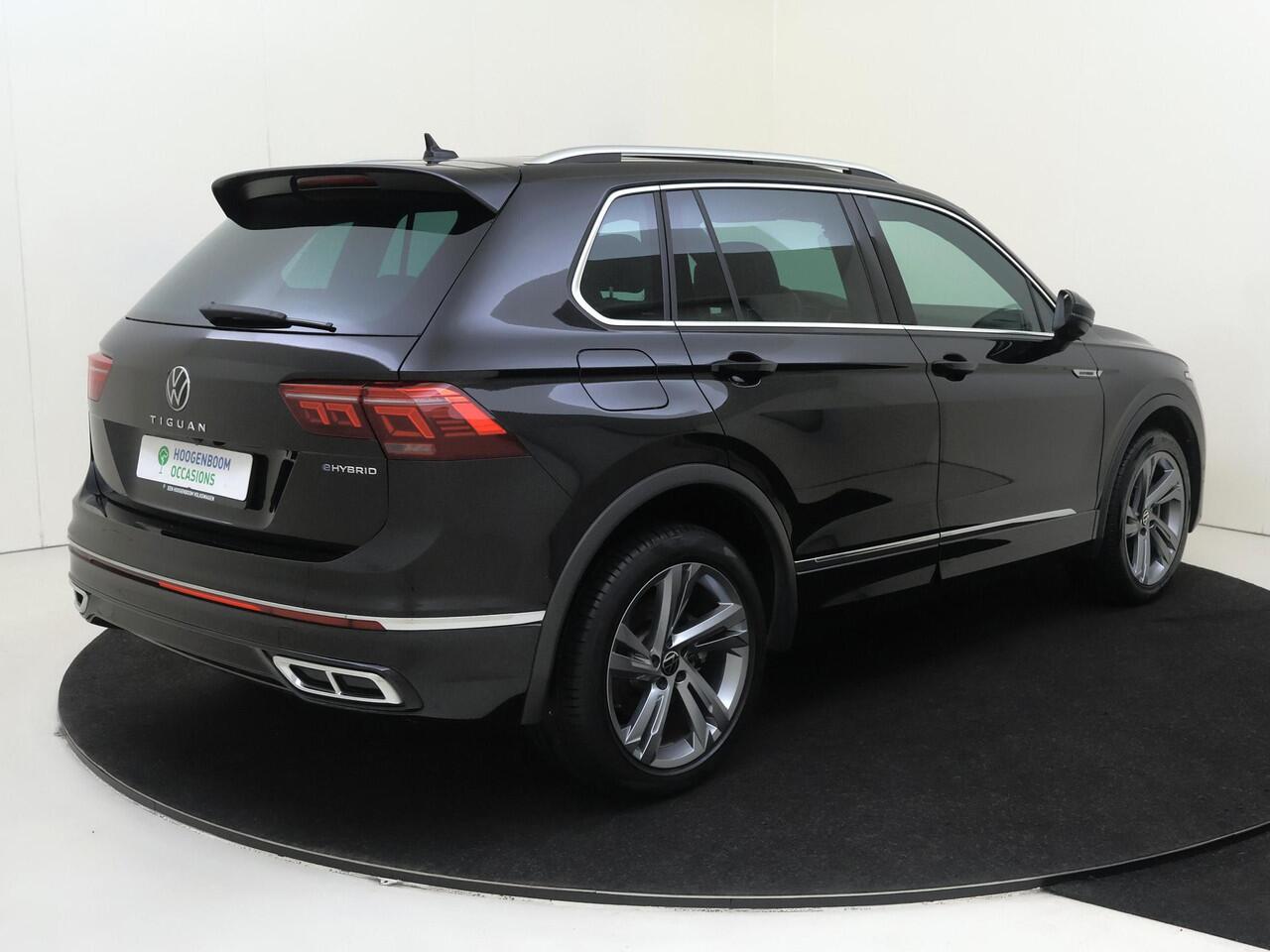 Volkswagen TIGUAN 1.4 TSI eHybrid R-Line Business | SoH 89% | Panoramadak | Trekhaak | Lederen bekleding | 360 camera | Keyless | Parkeerassistent | Stoel- en stuurwielverwarming | Navigatie |