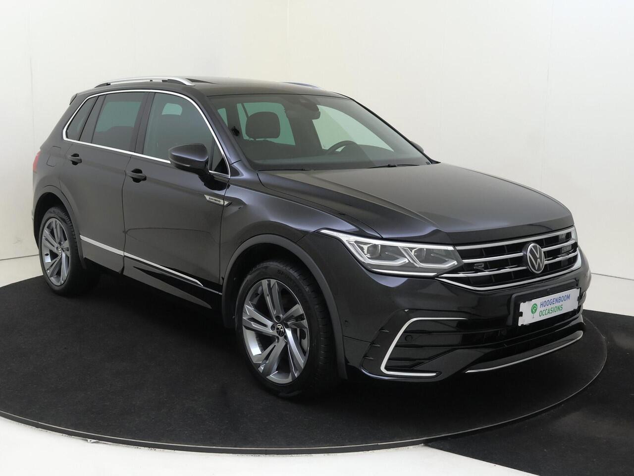 Volkswagen TIGUAN 1.4 TSI eHybrid R-Line Business | SoH 89% | Panoramadak | Trekhaak | Lederen bekleding | 360 camera | Keyless | Parkeerassistent | Stoel- en stuurwielverwarming | Navigatie |