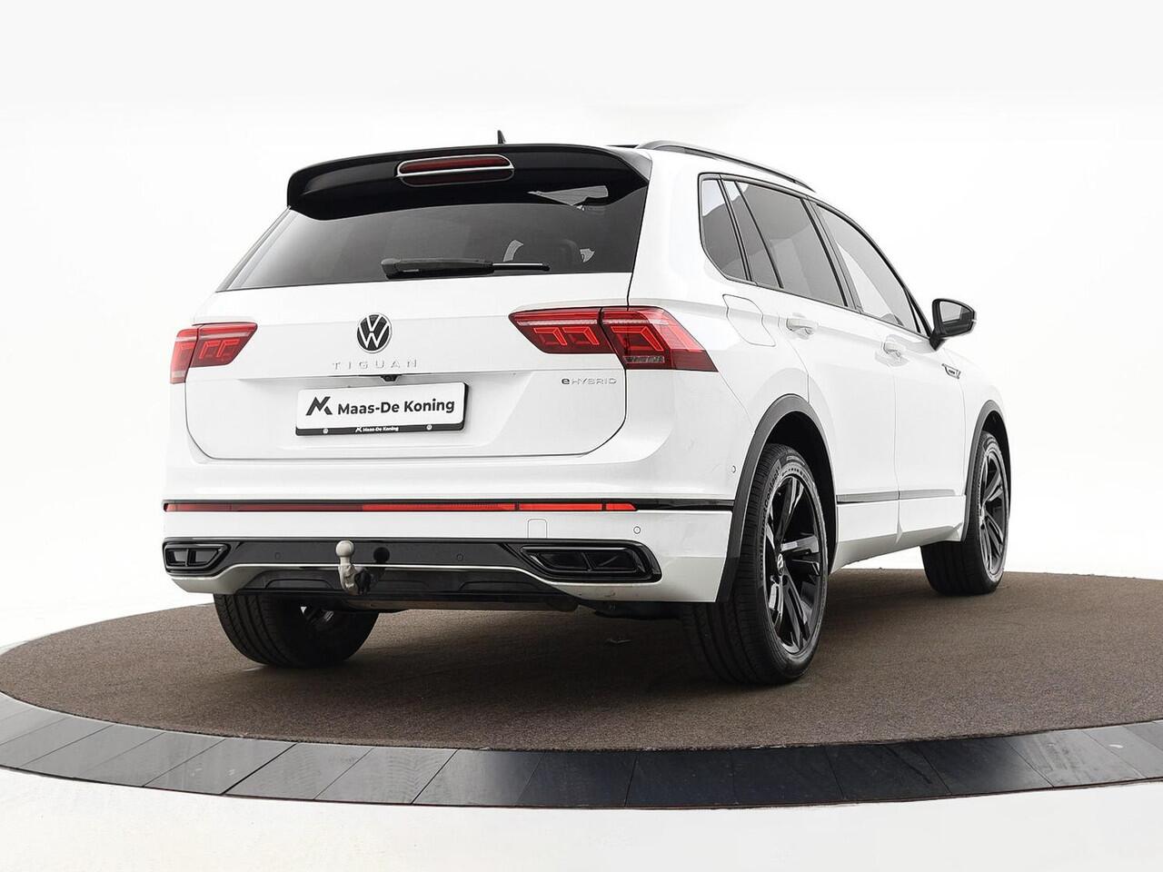 Volkswagen TIGUAN 1.4 TSI 245pk DSG eHybrid R-Line Business · SOH 92,8% · Panoramadak · Leder · 360 Camera · Inklap. Trekhaak · Matrix LED · Side Assist · Keyless · Stuur- & Stoelverwarming ·