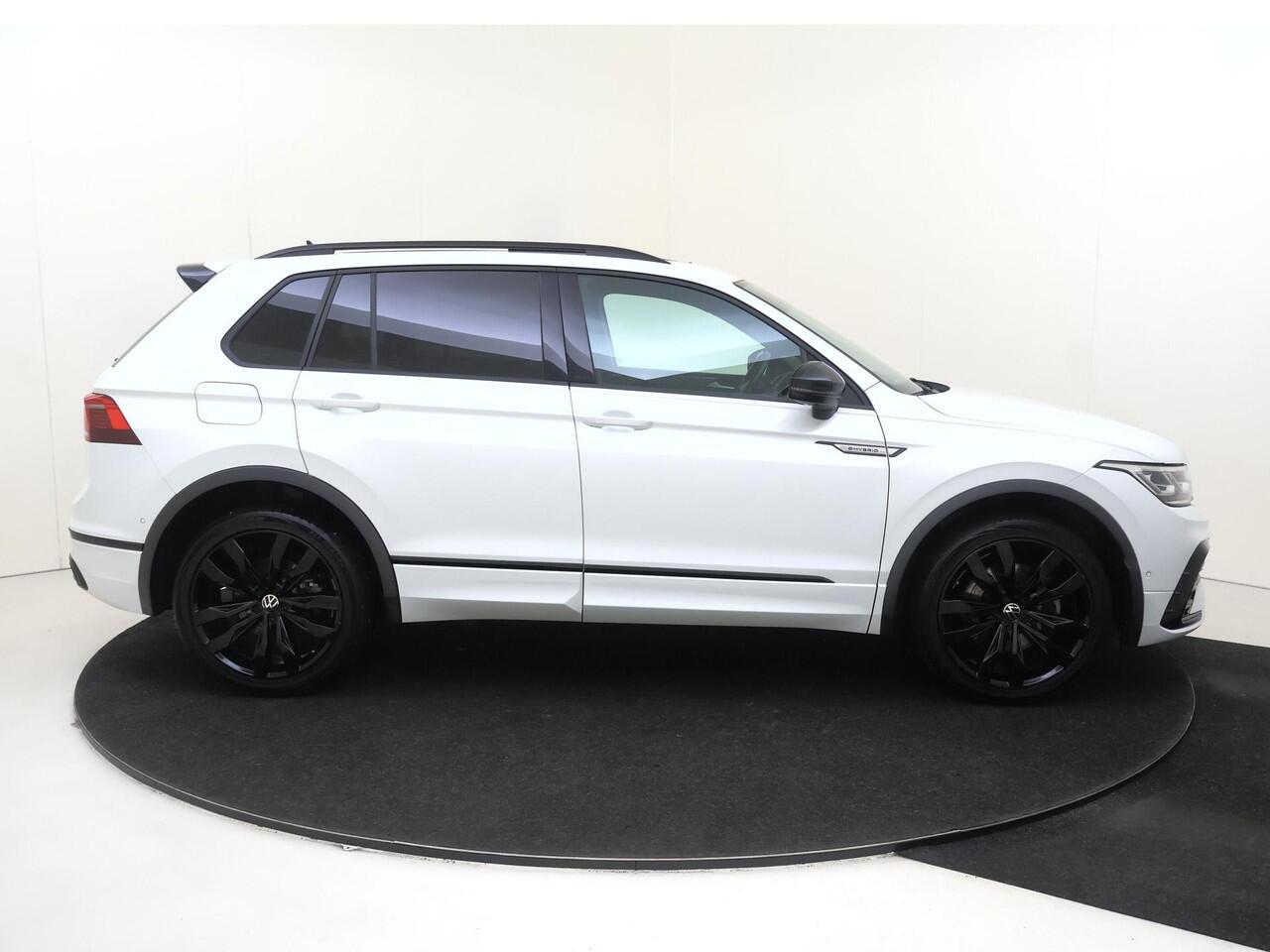 Volkswagen TIGUAN 1.4 TSI eHybrid R-Line Business | Panoramadak | 360 camera | Black style | Adaptieve demping | Lederen bekleding | LED matrix verlichting | Keyless | Dodehoek detectie | Adaptieve cruise control |