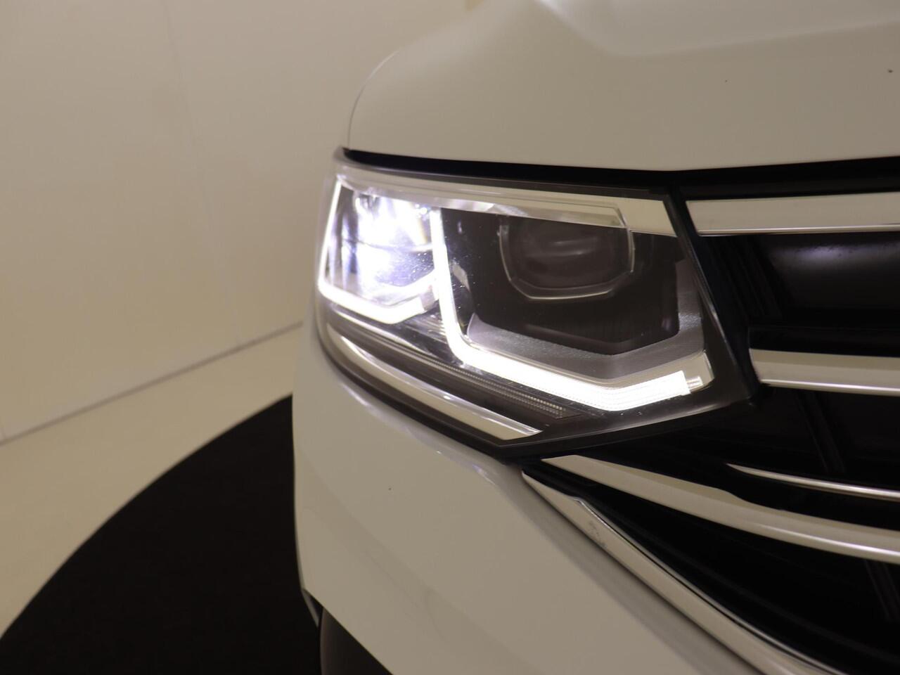 Volkswagen TIGUAN 1.4 TSI eHybrid R-Line Business | SoH 99% | Trekhaak | Parkeerassistent | Dodehoek detectie | Navigatie | Adaptieve cruise control | Keyless | Stoel- en stuurwielverwarming | LED matrix verlichting |