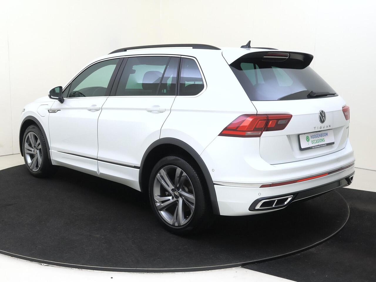 Volkswagen TIGUAN 1.4 TSI eHybrid R-Line Business | SoH 99% | Trekhaak | Parkeerassistent | Dodehoek detectie | Navigatie | Adaptieve cruise control | Keyless | Stoel- en stuurwielverwarming | LED matrix verlichting |