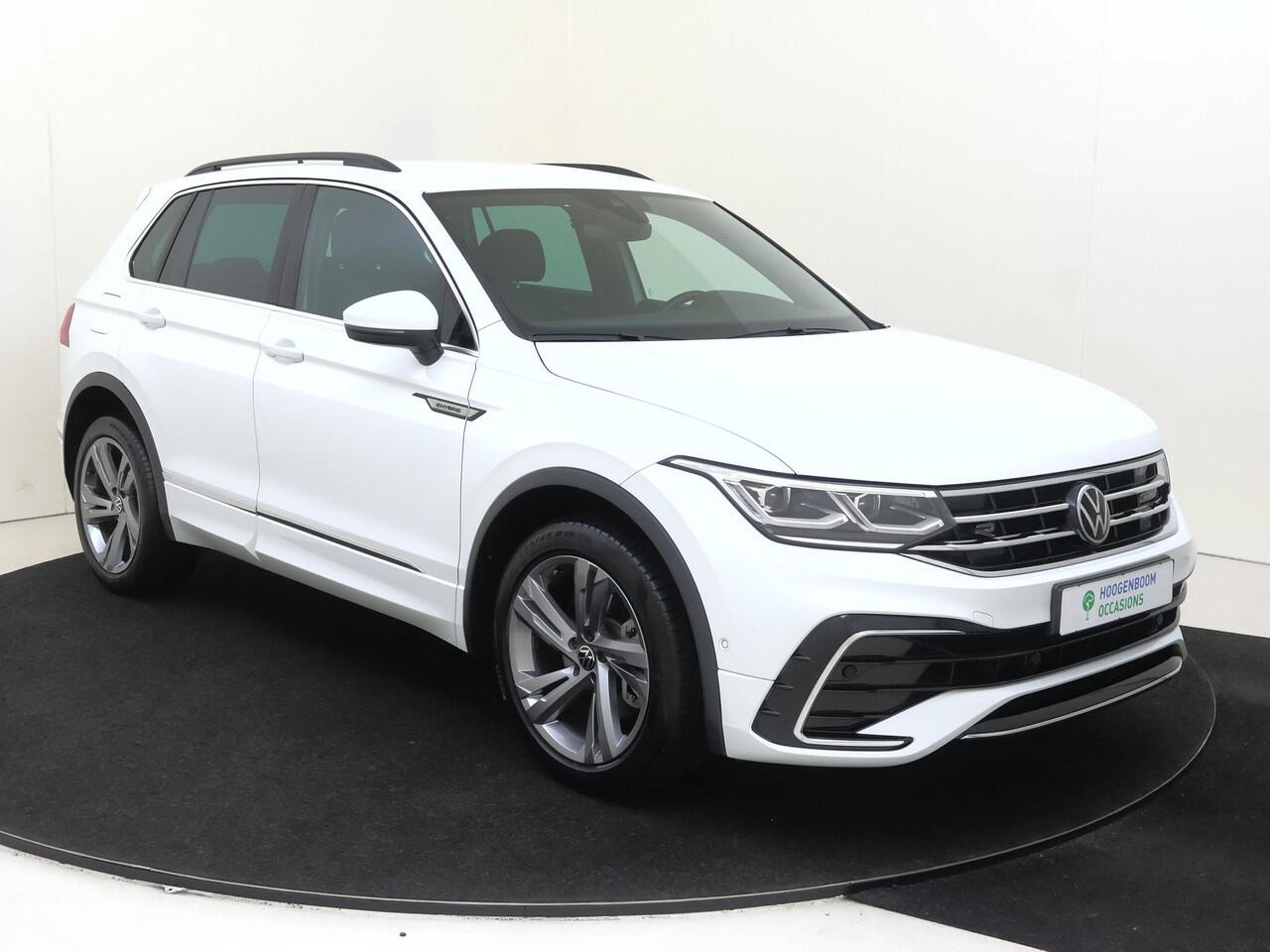 Volkswagen TIGUAN 1.4 TSI eHybrid R-Line Business | SoH 99% | Trekhaak | Parkeerassistent | Dodehoek detectie | Navigatie | Adaptieve cruise control | Keyless | Stoel- en stuurwielverwarming | LED matrix verlichting |