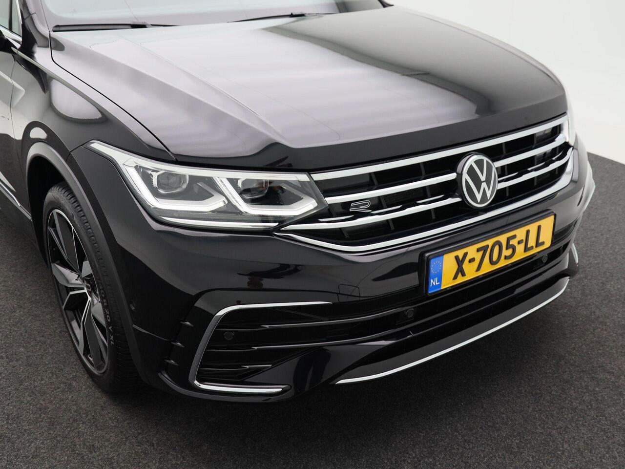 Volkswagen TIGUAN 1.4 TSi 145 Pk eHybrid R-Line Business Automaat | Trekhaak | LED | Stoel en Stuur Verwarming | Adaptive Cruise | Carplay | Navigatiesysteem | Parkeersensoren | Camera | Elektrische Achterklep | 20 Inch | 30.380 Km!!
