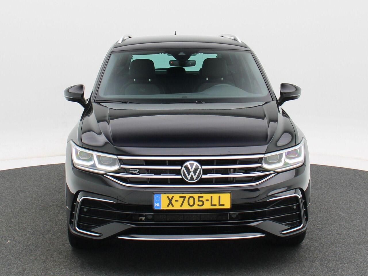 Volkswagen TIGUAN 1.4 TSi 145 Pk eHybrid R-Line Business Automaat | Trekhaak | LED | Stoel en Stuur Verwarming | Adaptive Cruise | Carplay | Navigatiesysteem | Parkeersensoren | Camera | Elektrische Achterklep | 20 Inch | 30.380 Km!!