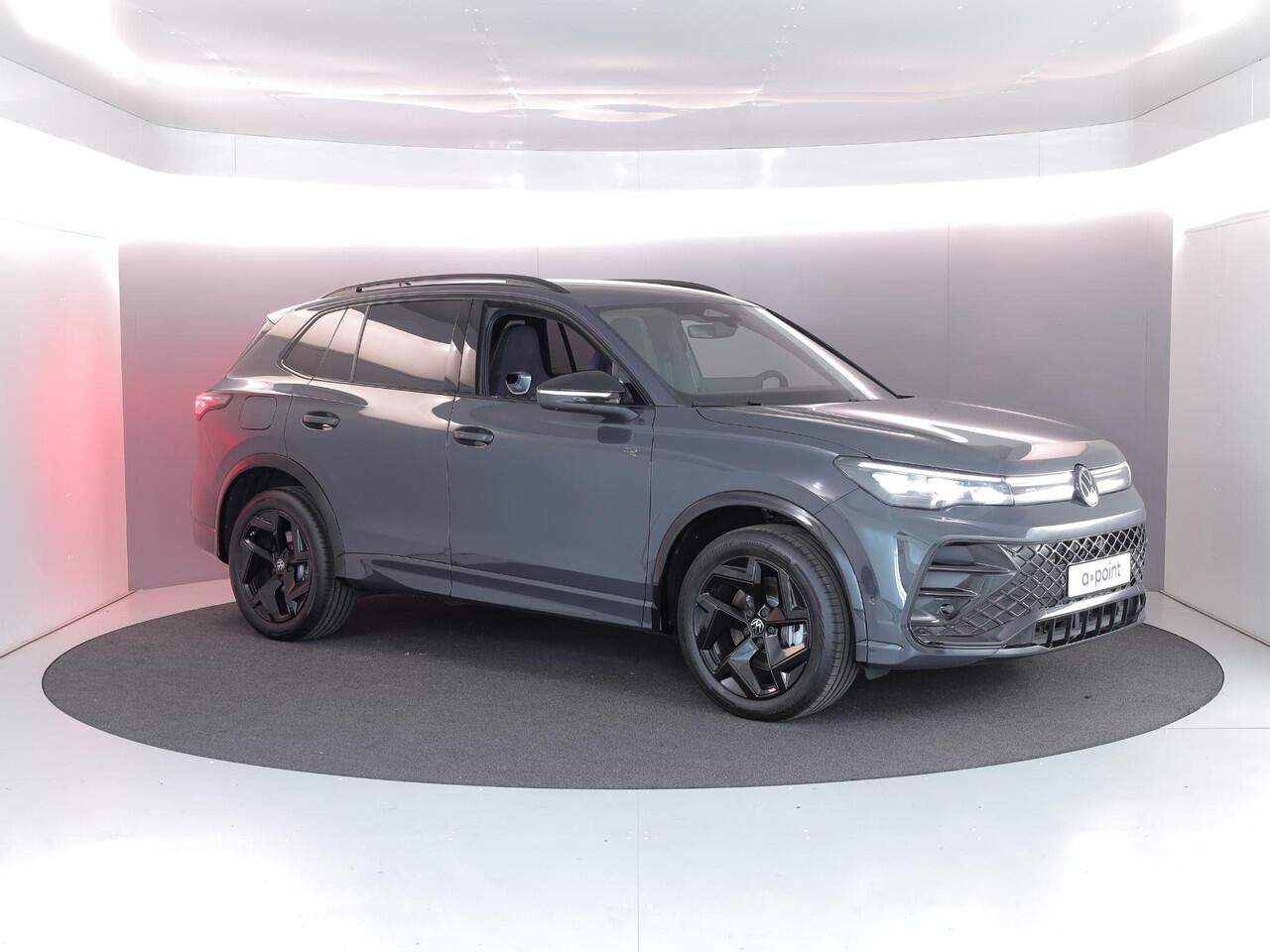 Volkswagen TIGUAN 1.5 eHybrid R-Line Edition 272 pk Automaat (DSG) | Verlengde garantie | Navigatie | Parkeersensoren (Park assist) | Rondomzicht camera | Stoelverwarming v/a | Black Style pakket | R-Line |