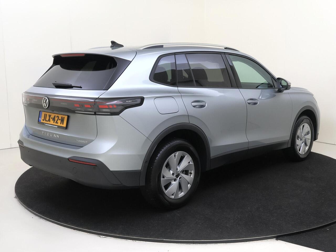 Volkswagen TIGUAN 1.5 eHybrid Life Edition | Trekhaak | Parkeerassistent | Adaptieve demping systeem | 3-zone airco | Dodehoek detectie | Keyless | Stoel- en stuurwielverwarming |