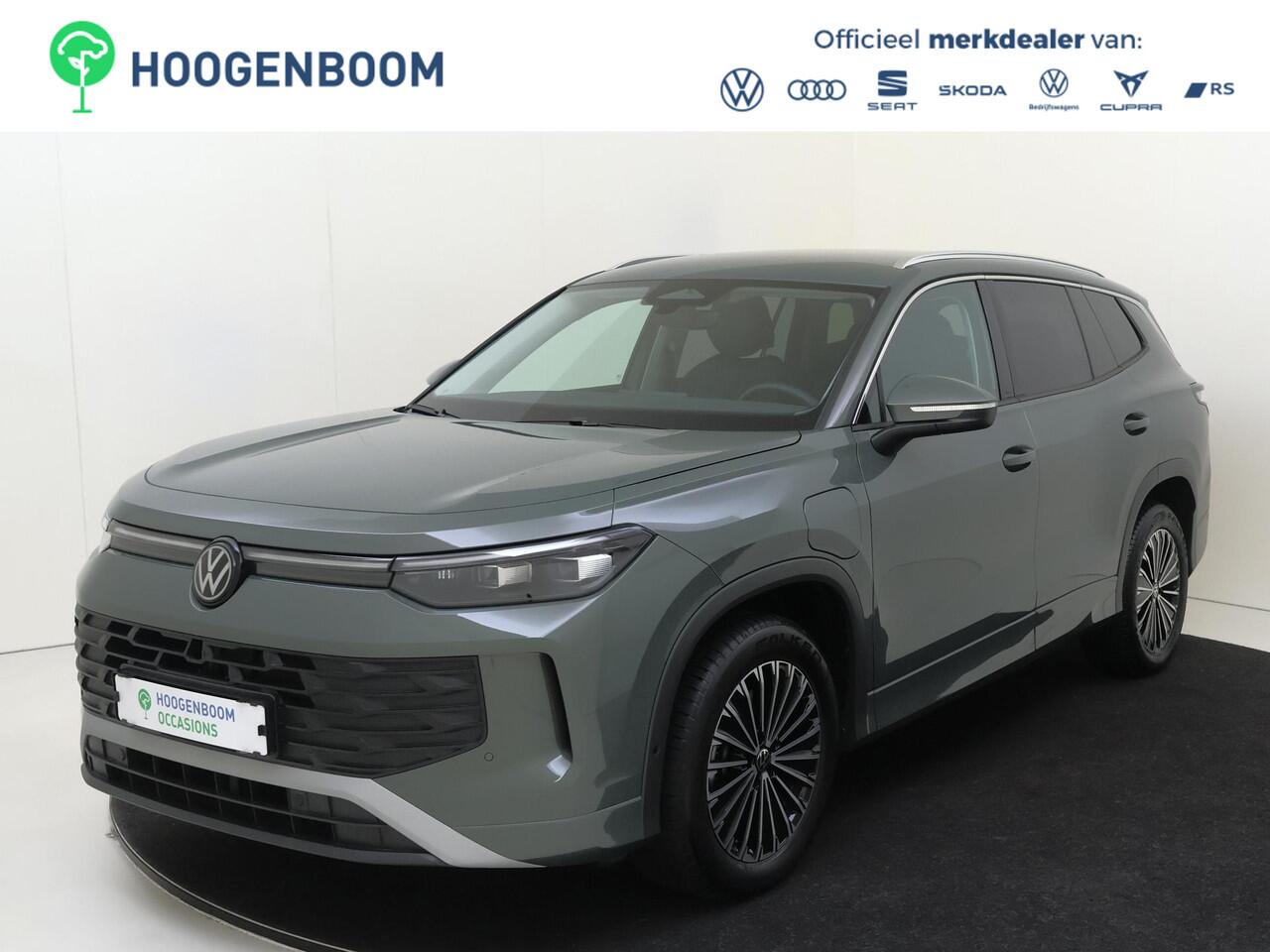 Volkswagen Tayron 1.5 eHybrid Life Edition | SoH 100% | Trekhaak | Adaptieve demping systeem | Achteruitrijcamera | 3-zone airco | Dodehoek detectie | Adaptieve cruise control | Stoel- en stuurwielverwarming | CarPlay |