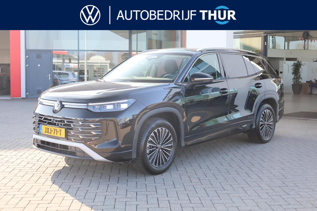 Volkswagen Tayron 1.5 eHybrid Elegance wegklapbare trekhaak leder / alcantara area view elektrische achterklep spiegel pakket navigatie IQ Matrix comfort telefoon laders 2 x travel assist ACC keys less acces & entry 18" LMV napoli privacy glas chroom pakket travel assist d