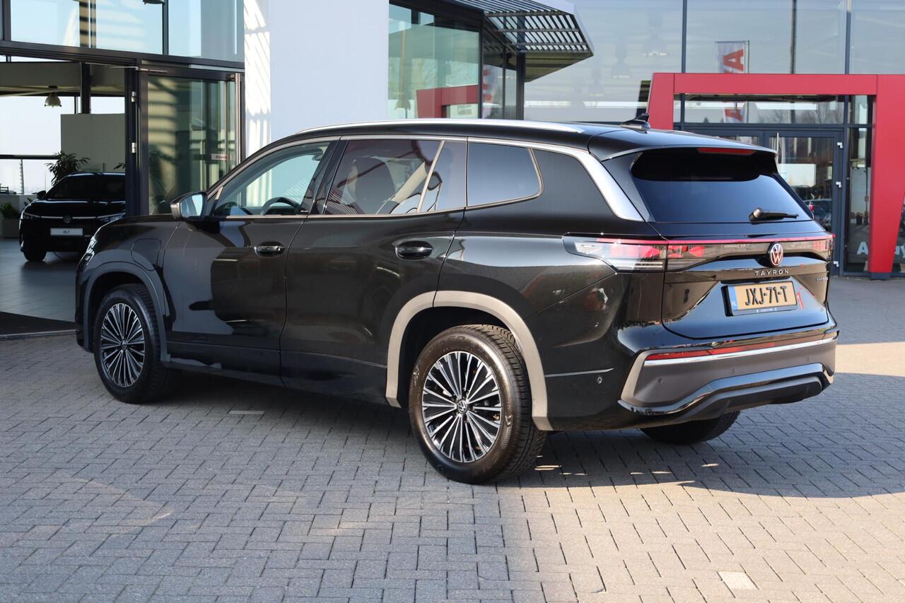 Volkswagen Tayron 1.5 eHybrid Elegance wegklapbare trekhaak leder / alcantara area view elektrische achterklep spiegel pakket navigatie IQ Matrix comfort telefoon laders 2 x travel assist ACC keys less acces & entry 18" LMV napoli privacy glas chroom pakket travel assist d