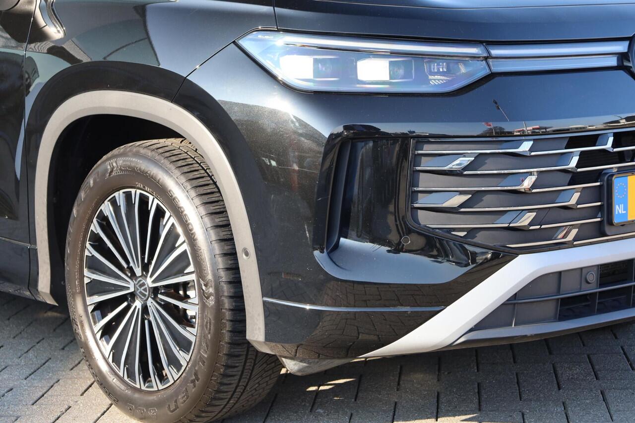 Volkswagen Tayron 1.5 eHybrid Elegance wegklapbare trekhaak leder / alcantara area view elektrische achterklep spiegel pakket navigatie IQ Matrix comfort telefoon laders 2 x travel assist ACC keys less acces & entry 18" LMV napoli privacy glas chroom pakket travel assist d